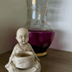 Buda porta vela pelado